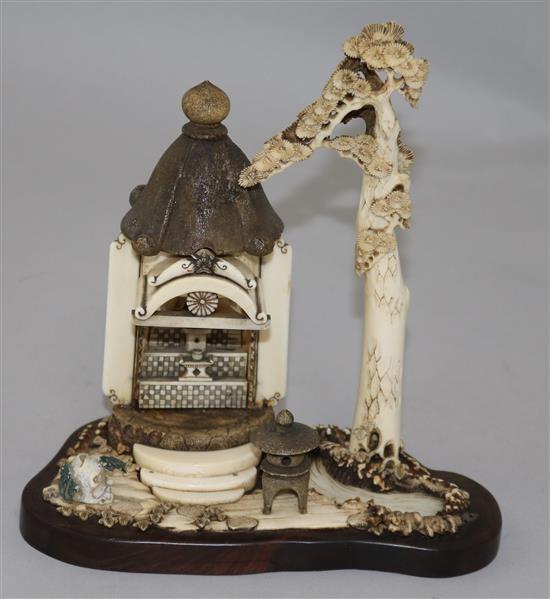 A Japanese ivory and bone model of a garden shrine, height 18.5cm